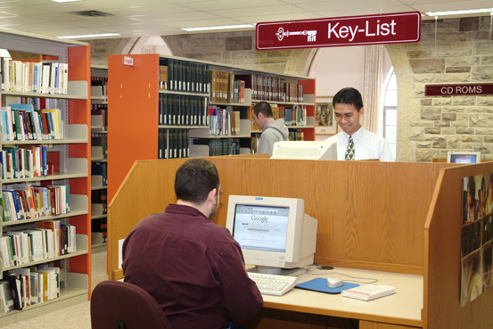 library with people using computers